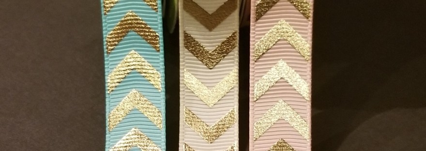 Three different colored patterned ribbons